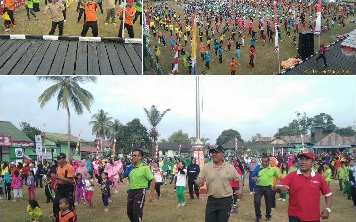 KAPOLSEK MUARA PAHU BESERTA ANGGOTA MENGHADIRI SENAM MASSAL DI LAPANGAN KEC. MUARA PAHU